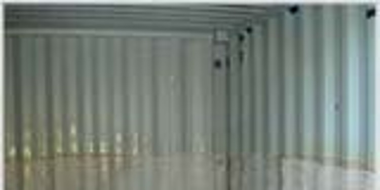 Cargo container with fabric attached