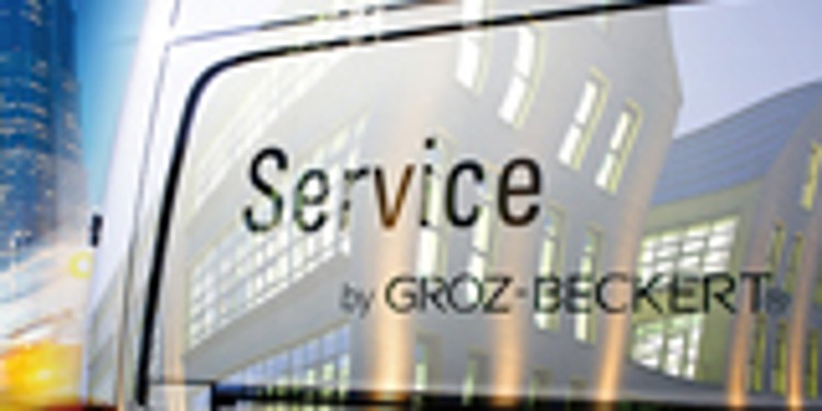 white service van with the lettering "Service by Groz-Beckert"