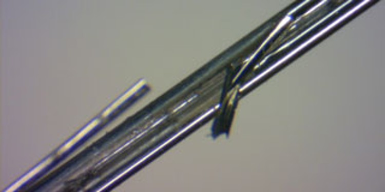 Flaking of twin-wire
